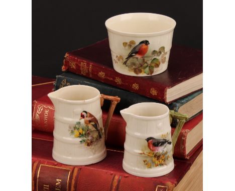 A Royal Worcester barrel shaped jug, painted by W. Powell, signed, with a Goldfinch, 7cm high, printed mark in green, date co