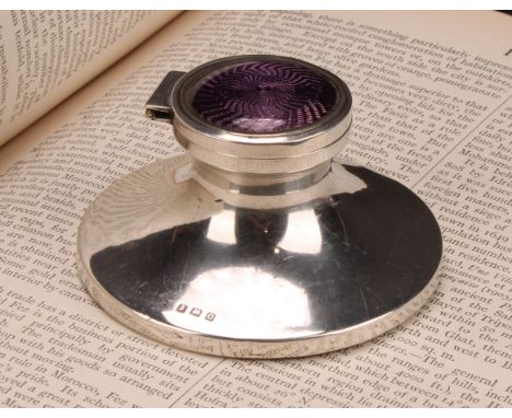 A George V silver and guilloche enamel capstan inkwell, hinged cover decorated in tones of purple, 8cm diam, Birmingham 1913 