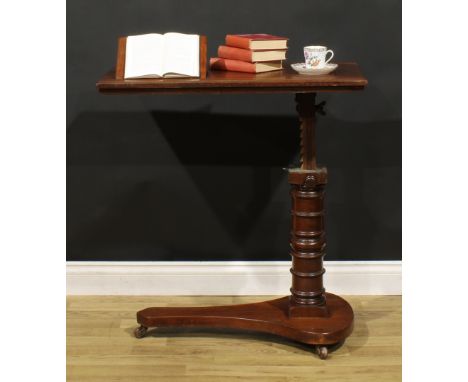 A Victorian walnut and mahogany adjustable reading stand or duet music table, rectangular top incorporating a pair of plateau