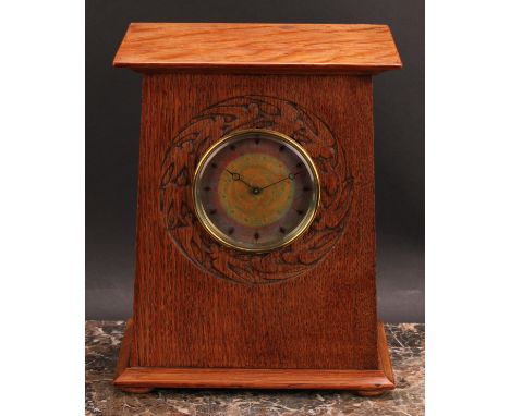 An Arts and Crafts oak mantel timepiece, 9cm circular dial decorated in mottled tones of orange and purple blush enamel, eigh