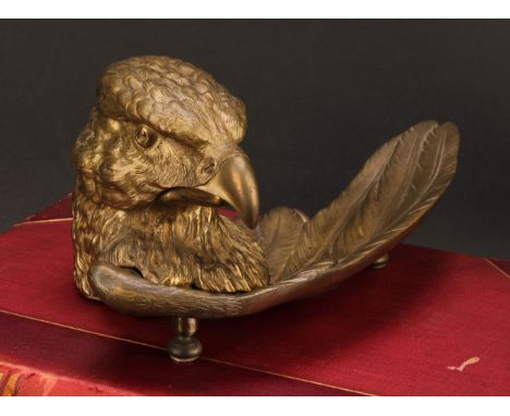 A French gilt metal novelty inkwell, cast as the head of an eagle, 28.5cm wide 