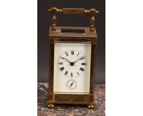 A French lacquered brass alarm carriage clock, 6.5cm rectangular enamel dial inscribed with Roman numerals, above an alarm se