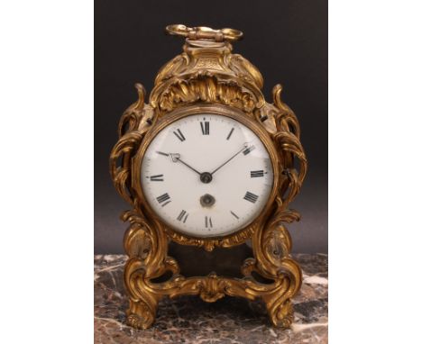 A Charles X ormolu table timepiece, 10.5cm convex enamel clock dial inscribed with Roman numerals, single winding hole, eight