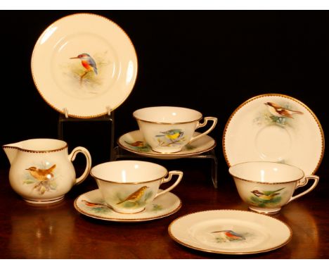 A set of three Royal Worcester teacups and saucers, painted by D. Jones, signed, with British birds, printed crown and circle