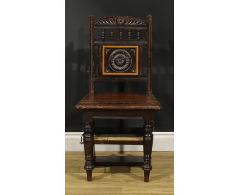 A late Victorian Aesthetic Movement metamorphic library step chair, spindle back with carved central panel, turned forelegs, 
