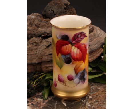 A Royal Worcester cylindrical vase, painted by Kitty Blake, signed, with autumnal leaves and berries on blush ivory ground, 1