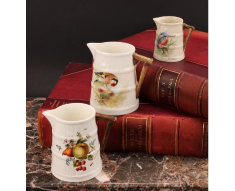 A Royal Worcester barrel shaped jug, painted by W. Powell, signed, with a Goldfinch, 11cm high, printed mark in green, date c