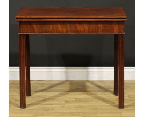 A George III mahogany card table, hinged top enclosing a baize lined playing surface, moulded internally-chamfered square leg