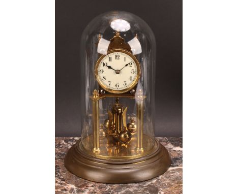 An early 20th century brass dome timepiece, 7cm circular enamel clock dial  inscribed with Arabic numerals, ‘300-day’ movemen
