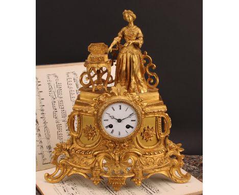 A 19th century French Louis XVI Revival ormolu mantel clock, 7.5cm white enamel dial inscribed with Roman numerals, twin-wind