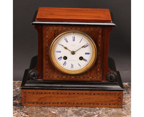 A late Victorian parcel-ebonised walnut mantel clock, 8.5cm circular enamel dial inscribed HUXTABLE NEWTON ABBOTT., twin wind