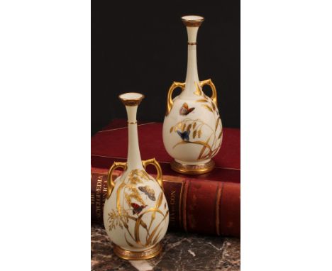 A pair of Royal Worcester two handled bottle vases, decorated in the Aesthetic manner with butterflies amongst raised gilt gr