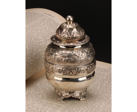 A William IV silver ovoid tea caddy, chased with fruiting vine, 13cm high, Robert Hennell, London 1831, 192g 