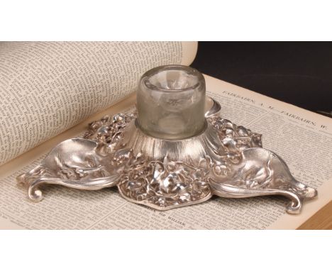 A Victorian electrotype triform inkwell, modelled with Bacchic masks and fruiting vine, 19.5cm wide, published by Elkington &