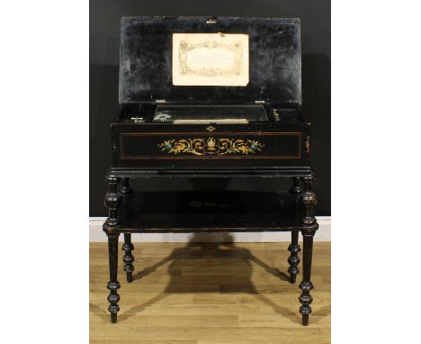 A 19th century Swiss ebonised music box on stand, 32.5cm cylinder playing twelve airs, serpentine undertier, turned legs, 78c