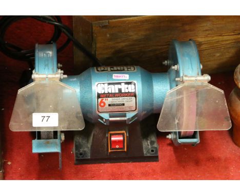 A Clarke 240 volt six inch metalwork bench grinder.