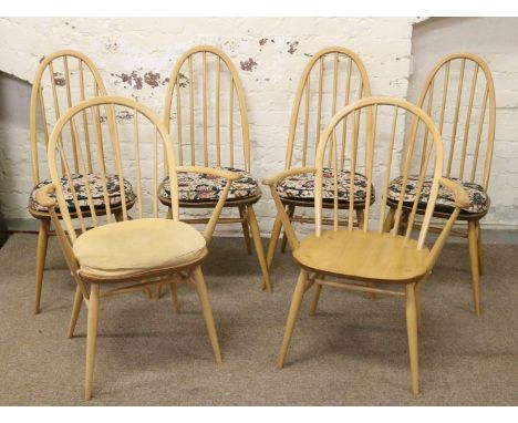 A good set of four Ercol spindle back Golden Dawn dining chairs and two carver arm chairs.