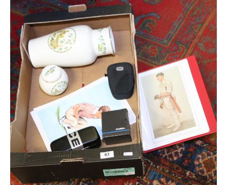 A box of miscellaneous to include a selection of golfer caricatures from Spy Magazine, a Casio wristwatch, a digital camera, 