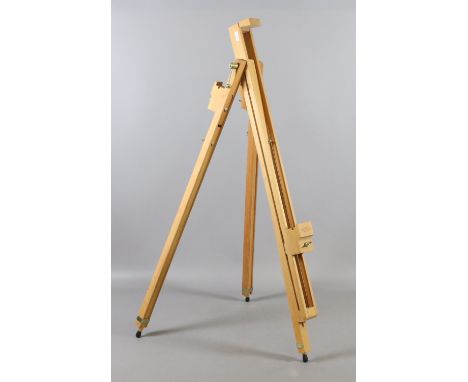 A Winsor & Newton folding table top artists easel.