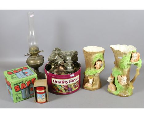 A Withernsea Fauna jug and vase and a tin of brass and copper ornaments along with an Edwardian oil lamp, a childs Peter Pan 