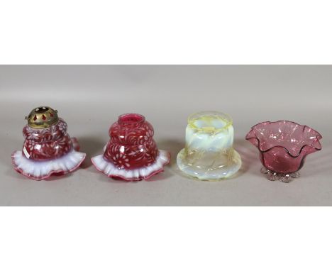A pair of cranberry glass and vaseline tinted lampshades, cranberry glass bon bon dish and a vaseline glass shade. Condition 