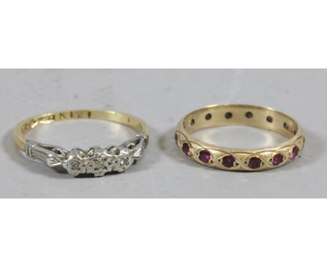 A ladies 18ct gold and platinum ring set with diamonds size M and a 9ct gold and ruby set ring size K.