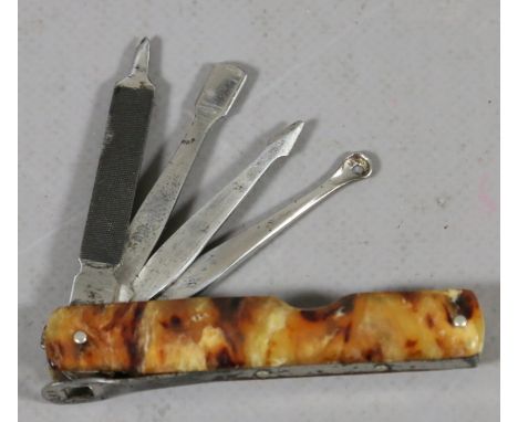 A multi tool pocket knife with folding blades, having tortoise shell effect scales and stamped D.R.P.