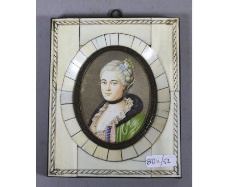 An ivory portrait miniature of an artistocratic woman, signed Verenet.