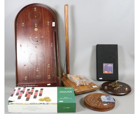 A collection of table top games to include two bar skittles, Solitaire, Noughts and Crosses, along with a Bagatelle board and