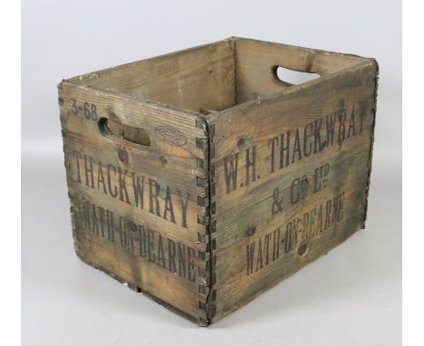 A vintage wooden beer bottle crate 'W M Thackery Wath-upon- Dearne'.