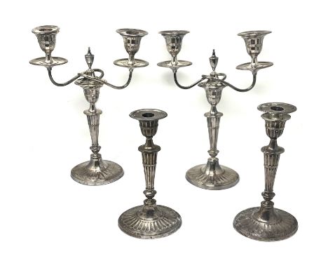 A PAIR OF VICTORIAN SILVER CANDLESTICKS, HARRISON BROTHERS &amp; HOWSON, SHEFFIELD, 1897, oval profile, fluted between reeded