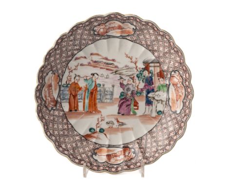 ‡ A RARE WORCESTER SAUCER DISH, CIRCA 1775, fluted 'French' shape, painted in the 'Mandarin' palette with Chinese figures in 