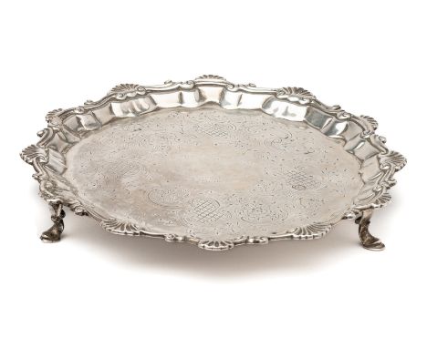 A GEORGE II SILVER SALVER, WILLIAM &amp; ROBERT PEASTON, LONDON, 1758, shaped circular, later engraved with a crest flanked b