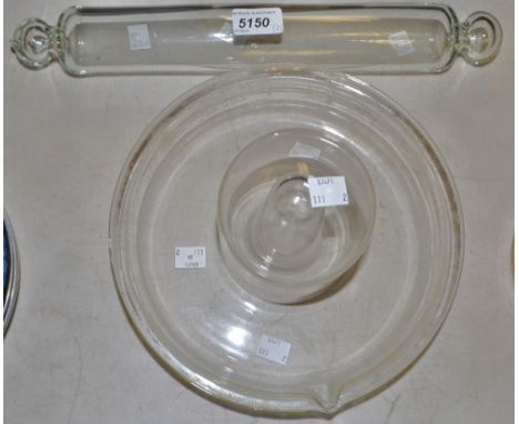 A Victorian glass bell jar;  a glass rolling pin (2)