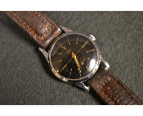 A Vintage Newark wrist watch, black face, five jewel