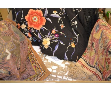 Textiles - a square Persian style sequin and beadwork panel, the centre with a slightly raised warrior on horseback; a fringe