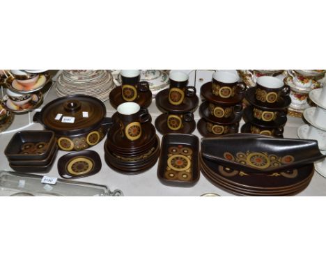 A Denby Arabesque table service, comprising tureen and cover, oval meat platters, hors d'oeuvre dishes, mugs, saucers, side p