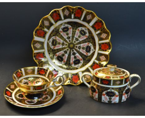 Royal Crown Derby 1128 Imari - a fluted dessert plate; a teacup and saucer; twin-handled sucrier, all first quality (3)