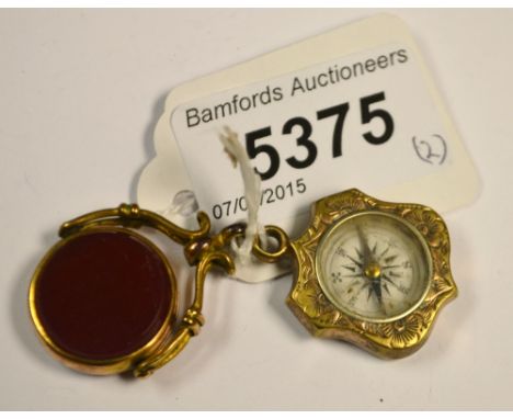 A Victorian bloodstone and cornelian swivel fob/compass fob (2)