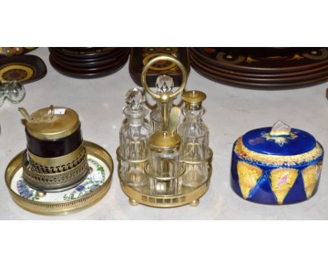 A Victorian Majolica Aesthetic Movement caddy and cover, moulded with fans and cranes, in ochre shades on a cobalt blue groun