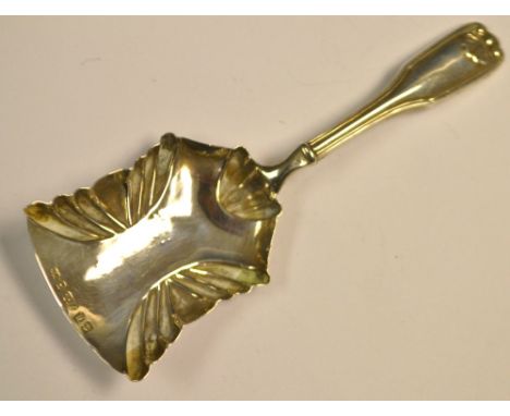 A William IV silver scuttle shaped Shell pattern caddy spoon, Thomas Millington, Birmingham 1834, 6.5g gross 