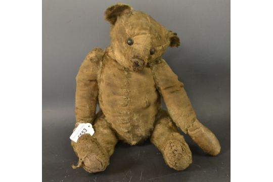 teddy bear with button in ear