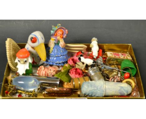 A blue Lucite 1950's hat pin; a Bakelite sewing kit; glass lamp work stick pins; thimbles; etc.