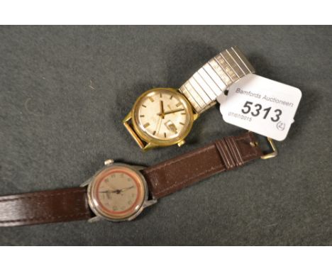 A Bulova day/date auto wristwatch, twenty-three jewel; a Roamer vintage wrist watch (2)
