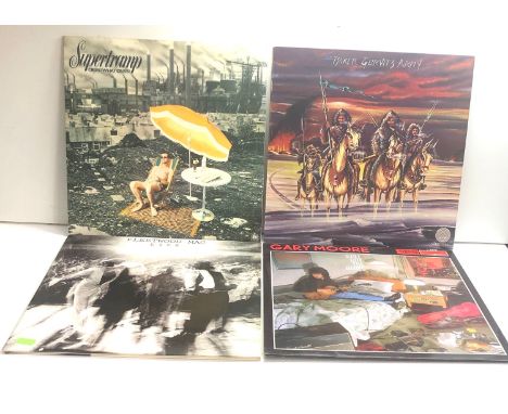 4 vintage lps includes Gary moore fleetwood mac supertramp and the baker gurvitz army 