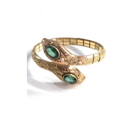 Rolled gold and paste torque snake bangle 