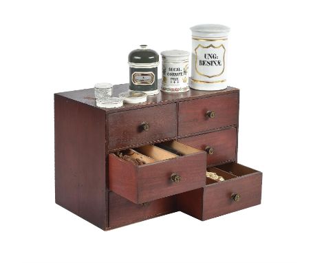 A late Victorian stained hardwood collectors' cabinet, circa 1900, with six drawers containing various spices and specimens; 
