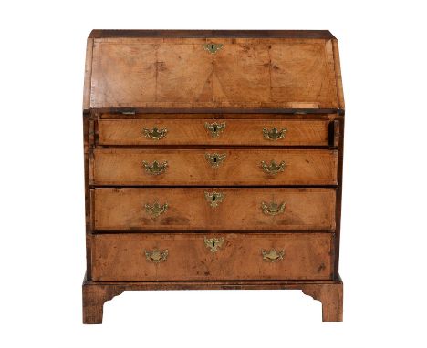 A George II walnut and feather banded bureau, circa 1740, the fall enclosing a fitted interior, 101cm high, 94cm wide, 51cm d