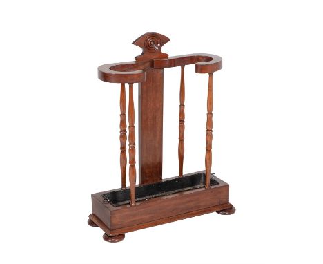 A Victorian mahogany stick stand, circa 1860, 83cm high, 61cm wide, 35cm deep Please note the measurements in the original pd