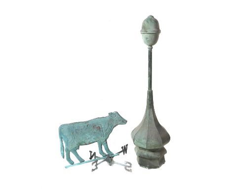 A verdigris copper weathervane modelled as a cow, early 20th century, probably British or American; with two associated point